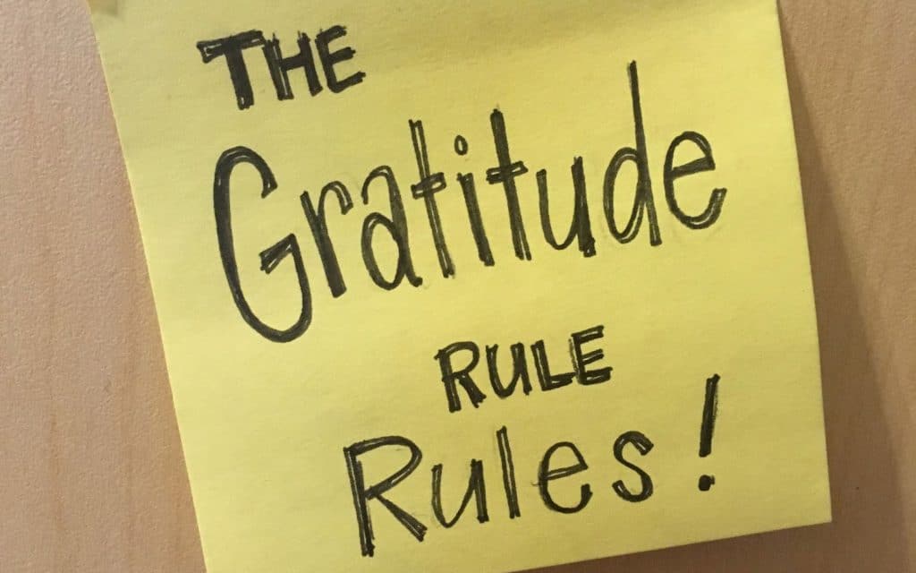 Post-it Note with Gratitude Rule Written On It